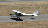 N67384 @ KRHV - Locally-based 1978 Cessna 152 landing on runway 31L at Reid Hillview Airport, San Jose, CA. Photo taken from the control tower. - by Chris Leipelt