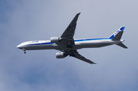 JA778A @ BFI - Boeing 777 on final for Seatac. Photo taken from Boeing Field. - by Eric Olsen