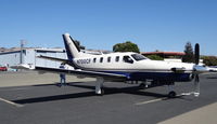 N700CF @ KRHV - Locally-based 1996 Socata TBM-700 sitting on the hot transient ramp before we taxi it to Lafferty at Reid Hillview Airport, San Jose, CA. - by Chris Leipelt