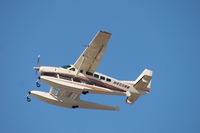 N459WM @ BFI - Cessna 208 after takeoff from Boeing Field. - by Eric Olsen