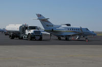 N676JB @ KAPC - Locally-based Jelly Belly Hawker 800XP N676JB being refueled @ Napa County Regional Airport, CA - by Steve Nation