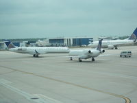 N779SK @ IAH - SkyWest Taxing Out Next to Three aircraft - by Christian Maurer