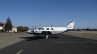 N159D @ KRHV - Apline Transportation LLC (Cambria, CA) 1974 Piper Navajo sitting on the transient ramp a few hours before departure at Reid Hillview Airport, San Jose, CA. - by Chris Leipelt