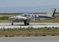 N2VV @ KSQL - Redding, CA-based 1976 Beech 58TC begins takeoff roll for KLVT (Livermore, CA) @ San Carlos Municipal Airport, CA - by Steve Nation