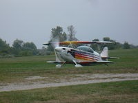 N3DY @ 40I - Christen Eagle II Ready To Taxi in the rain - by Christian Maurer