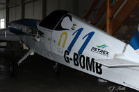 G-BOMB @ EGPT - Looking rather worse for wear at the back of a hangar at Perth EGPT. No wings, no engine. - by Clive Pattle