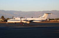 N3229A @ KOXR - Ameriflight 1986 Beech 1900C on daily mail run @ Oxnard Airport, CA in low light conditions - by Steve Nation