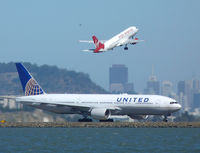 N212UA @ SFO - Action with San Francisco in the background 12 miles away. - by Bill Larkins