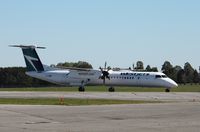 C-FOWE @ CYOW - DHC-8-402 - by Mark Pasqualino