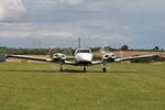 G-OOON @ X5FB - Piper PA-34-220T Seneca III taxis in bringing the pilot of T6 G-BJST for the return to Duxford. Fishburn Airfield, August 29th 2015. - by Malcolm Clarke