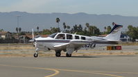 N262EA @ KRHV - Dragonbow LLC (Wilmington, SE) 2001 Beechcraft A36 Bonanza taxing to transient parking at Reid Hillview Airport, San Jose, CA. - by Chris Leipelt