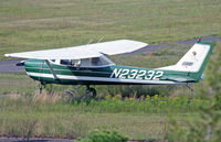 N23232 @ KBLM - An avocado green 1968-build Cessna 150 blends in well with her surroundings. - by Daniel L. Berek