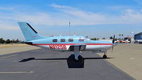 N9125B @ KRHV - Stockton Aviation Group LLC (Stockton, CA) colorful 1987 Piper Malibu parked on the transient ramp at Reid Hillview Airport, San Jose, CA. - by Chris Leipelt
