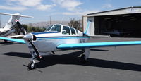 N5714K @ KRHV - Locally-based 1964 Beechcraft Debonair parked in front of the Lafferty Hangar (for sale @ www.laffertyair.com) at Reid Hillview Airport, San Jose, CA. - by Chris Leipelt