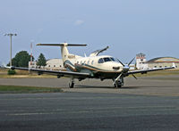 N900HS @ KBLM - This Swiss single-engine turboprop loads up for another trip. - by Daniel L. Berek