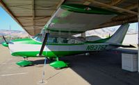 N8375Z @ KRHV - Locally-based bright green 1963 Cessna 210 sitting at its tie down under the shelters at Reid Hillview Airport, San Jose, CA. - by Chris Leipelt