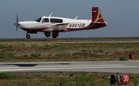 N961DB @ KSQL - 2007 Mooney M20TN from Lake Tahoe, CA over the threshold @ San Carlos Airport, CA - by Steve Nation