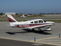 N2395V @ KSQL - Locally-based 1985 Piper PA-28-181 Cherokee performing engine checks @ San Carlos Airport, CA - by Steve Nation