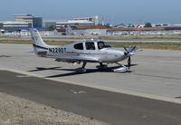 N229DT @ KSQL - Locally-based 2012 Cirrus Design SR22 taxiing @ San Carlos Airport, CA - by Steve Nation
