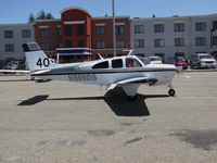 N599DS @ KCCR - Ventura County, CA-based 1967 Beech E33A Bonanza arriving for the 2014 Air Race Classic as Race #40. Photo at Concord, CA prior to start of the cross country event. Pilots were Lucia Gaigano and Judy Phelps aka Team Juci. - by Steve Nation