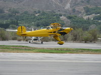 N1017U @ SZP - 1939 Bucker JUNGMANN C.A.S.A. 1.131, Lycoming O-360 180 Hp upgrade, landing Rwy 22L grass - by Doug Robertson