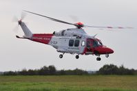 G-CILN @ EGFH - Visiting HM Coastguard rescue helicopter (Rescue 187) departing Runway 04 after taking on fuel. - by Roger Winser