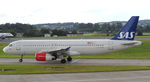OY-KAM @ EGPH - SAS2514 taxiing to runway 06 for departure to CPH - by Mike stanners