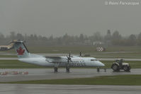 C-FACT @ CYVR - Being towed to departures, C wing. - by Remi Farvacque