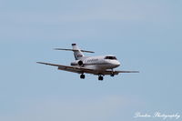 N873QS @ KSRQ - Raytheon Hawker 800 (N873QS) arrives at Sarasota-Bradenton International Airport following flight from Cyril E King International Airport - by Donten Photography