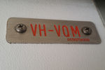 VH-VQM @ BNE - registration plate on entrance bulkhead - by Bill Mallinson