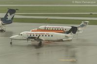 C-FCMV @ CYVR - Fueling up. - by Remi Farvacque