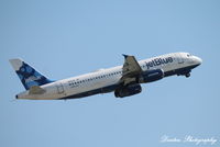 N641JB @ KSRQ - JetBlue Flight 164 (N641JB) Blue Come Back Now Ya Hear departs Sarasota-Bradenton International Airport enroute to John F Kennedy International Airport - by Donten Photography