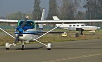 N182AK @ KRHV - Locally-based 1979 Cessna 182Q taxing out for an IFR departure at Reid Hillview Airport, San Jose, CA. The transient Piper, just behind it, its clear of 31R and taxing to the ramp.  - by Chris Leipelt