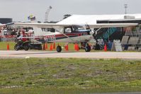 N67306 @ KLAL - Arriving at Lakeland, FL during Sun N Fun 2013 - by Bob Simmermon