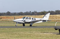 VH-UKL @ YTEM - Beech 58 Baron (VH-UKL) taxiing at Temora Airport. - by YSWG-photography