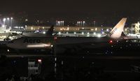 D-AALB @ LAX - Best I could of Aero Logic 777 from my hotel room shooting between buildings - by Florida Metal
