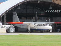 ZK-MCE @ NZQN - Hiding in their hangar at QT - by magnaman
