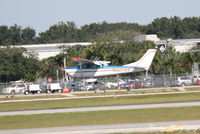 N9270X @ KSRQ - Cessna Skylane (N9270X) arrives at Sarasota-Bradenton International Airport - by Donten Photography