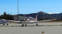 N2210X @ E16 - Locally-based 1979 Piper PA-28-161 taxing out for departure from the south tie downs at South County Airport, San Martin, CA. - by Chris Leipelt