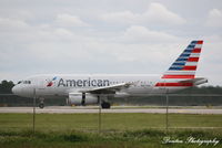 N827AW @ KRSW - American Flight 1839 (N827AW) arrives at Southwest Florida International Airport following flight from Philadelphia International Airport - by Donten Photography
