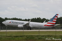 N946NN @ KRSW - American Flight 1477 (N946NN) departs Southwest Florida International Airport enroute to Chicago-O'Hare International Airport - by Donten Photography