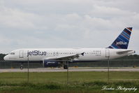 N595JB @ KRSW - JetBlue Flight 1129 (N595JB) Rhythm & Blues arrives at Southwest Florida International Airport following flight from John F Kennedy International Airport - by Donten Photography