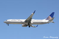 N38467 @ KSRQ - United Flight 1778 (N38467) arrives at Sarasota-Bradenton International Airport following flight from Chicago-O'Hare International Airport - by Donten Photography