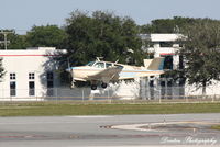 N9009Q @ KSRQ - Beechcraft Bonanza (N9009Q) arrives at Sarasota-Bradenton International Airport - by Donten Photography