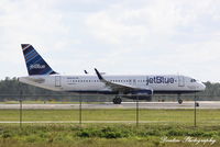 N806JB @ KRSW - JetBlue Flight 1512 (N806JB) Objects in Mirror Are Bluer Than They Appear departs Southwest Florida International Airport enroute to Newark-Liberty International Airport - by Donten Photography