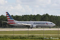 N976UY @ KRSW - American Flight 1837 (N976UY) arrives at Southwest Florida International Airport following flight from Charlotte-Douglas International Airport - by Donten Photography