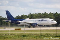 N709JB @ KRSW - JetBlue Flight 904 (N709JB) departs Southwest Florida International Airport enroute to Bradley International Airport - by Donten Photography