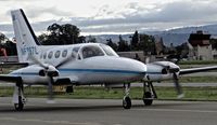 N6867L @ KRHV - Locally-based Cessna 421C taxing in after some VFR test flying around So-Cal at Reid Hillview Airport, San Jose, CA - by Chris Leipelt
