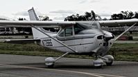 N7266S @ KRHV - Locally-based 1976 Cessna 182P taxing in just before a storm at Reid Hillview Airport, San Jose, CA - by Chris Leipelt
