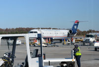 N259PS @ KCLT - At the gate CLT - by Ronald Barker